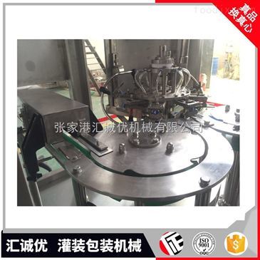 揭秘高效生產核心 沖洗、灌裝、封口三合一飲料包裝機